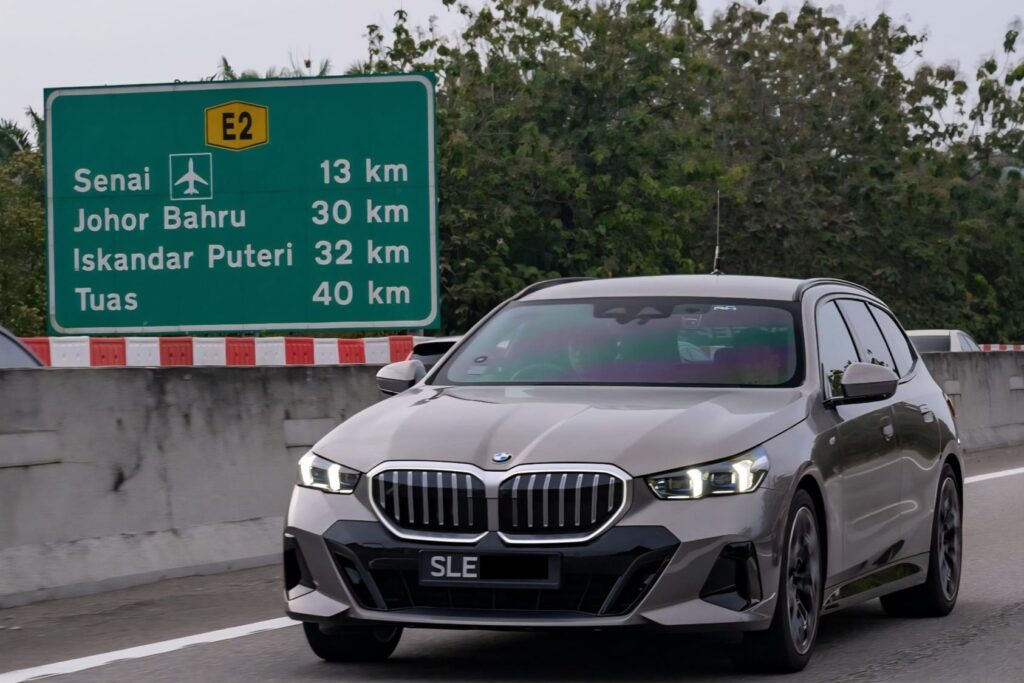BMW 520 Touring on a driveway organised by Performance Motors Limited